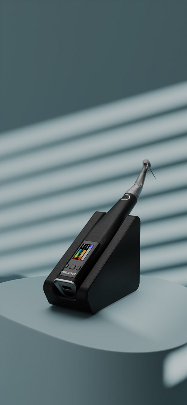 Statera vi cordless endo motor with integrated apex locator placed on a cradle with internal power bank